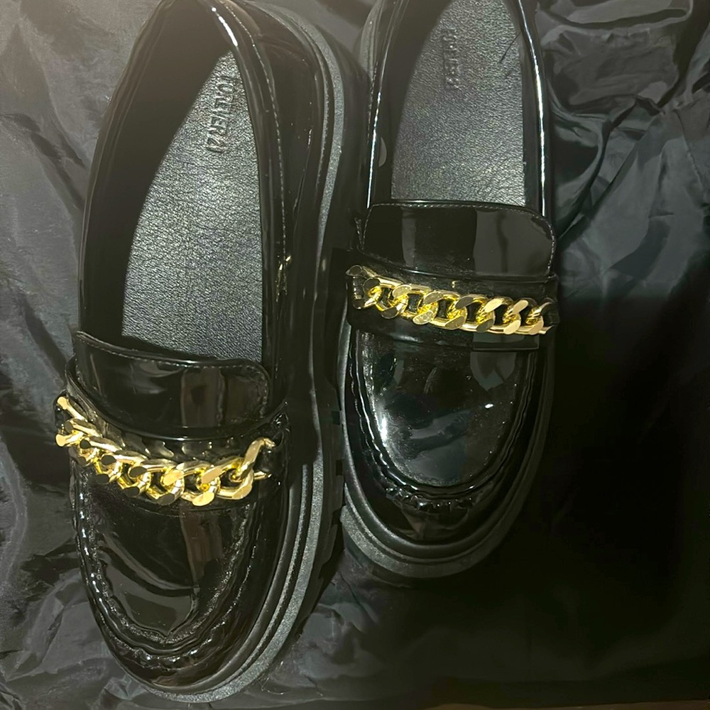 Pantent leather chunky heeled loafer with gold embellishments
